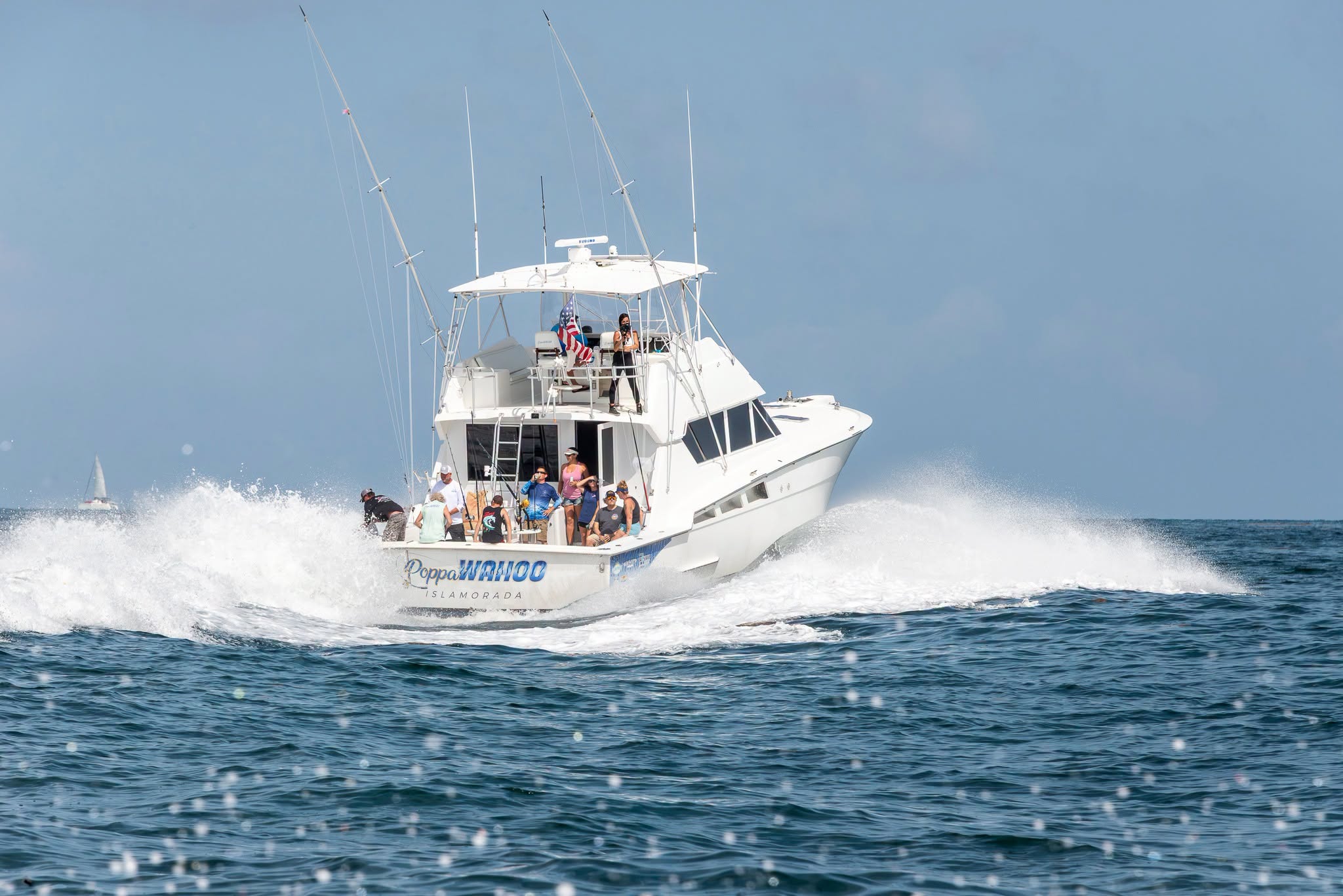The Poppa Wahoo running offshore with a full crew aboard