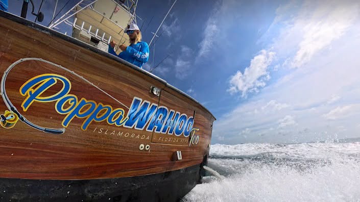 The woodgrain bow of the Poppa Wahoo Too