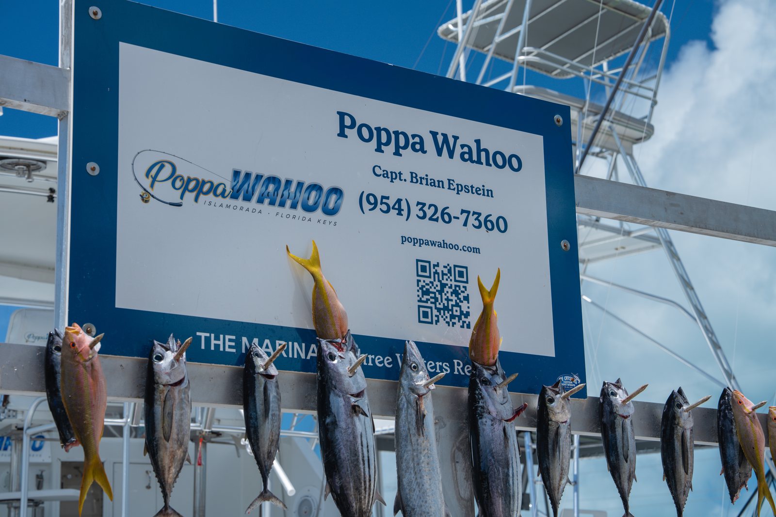 The day's catch hung under the Poppa Wahoo sign at Three Waters