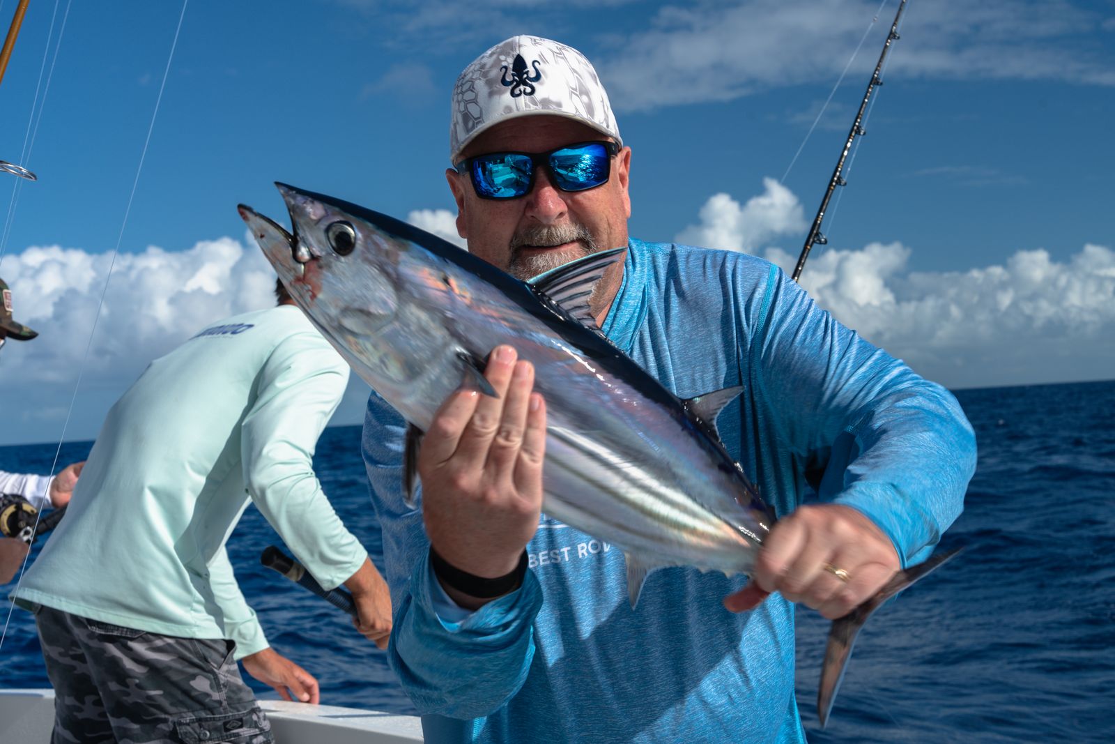 Young angler with a blackfin tuna caught over the Islamorada humps with Poppa Wahoo