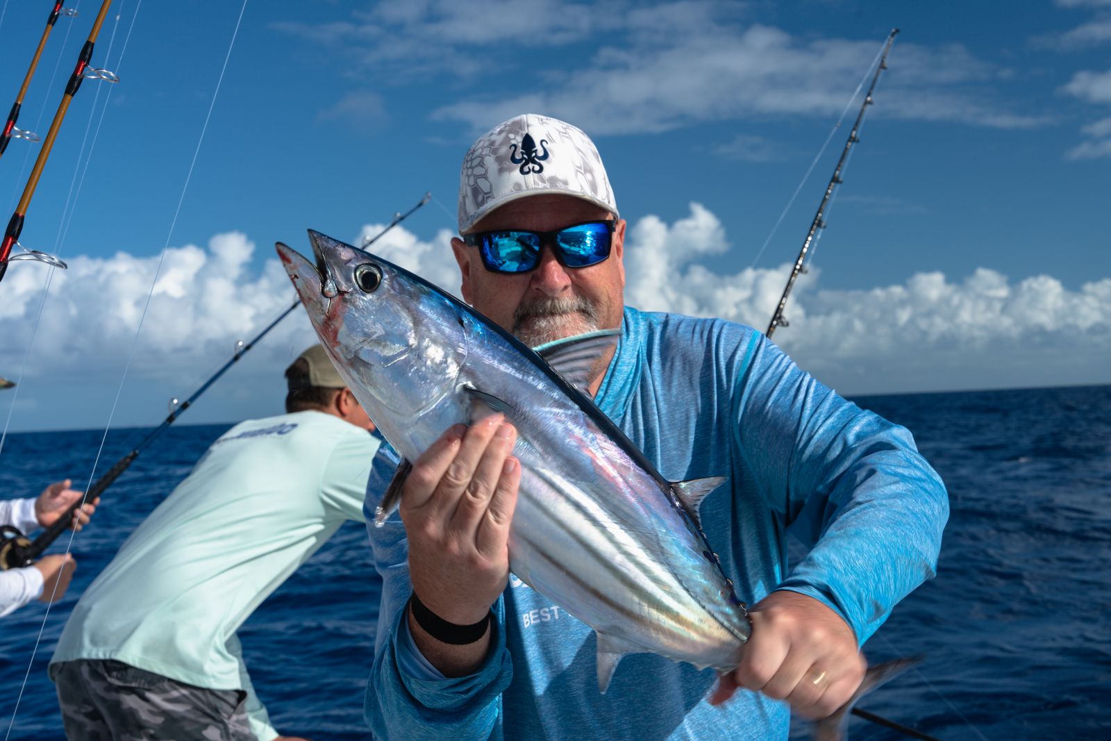 A blackfin tuna held up on the troll