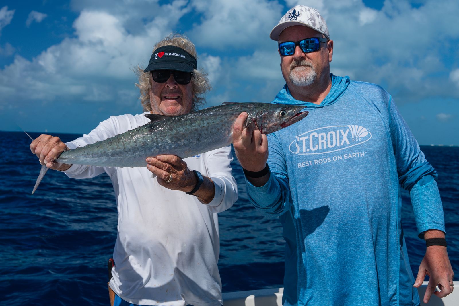 Two anglers with blackfin