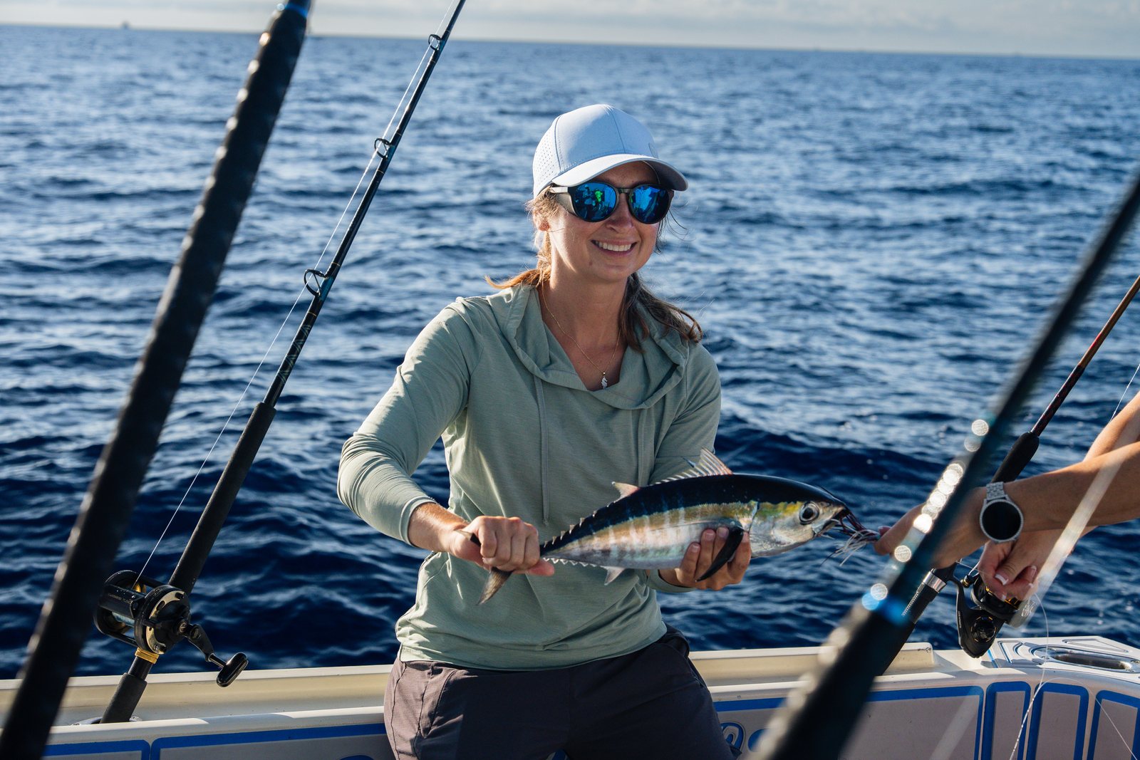 An angler with her blackfin tuna