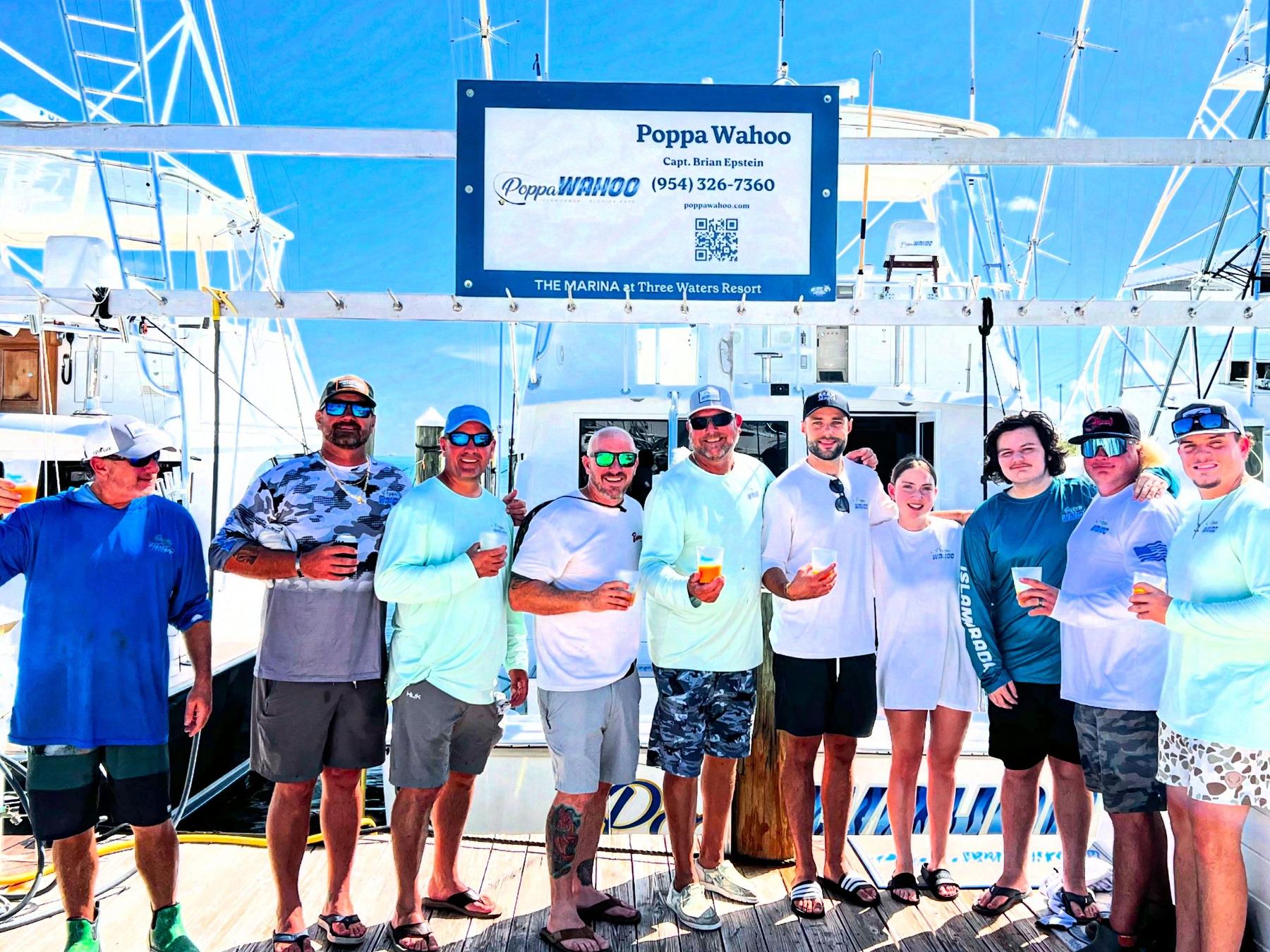 A full group at the dock at The Marina at Three Waters Resort